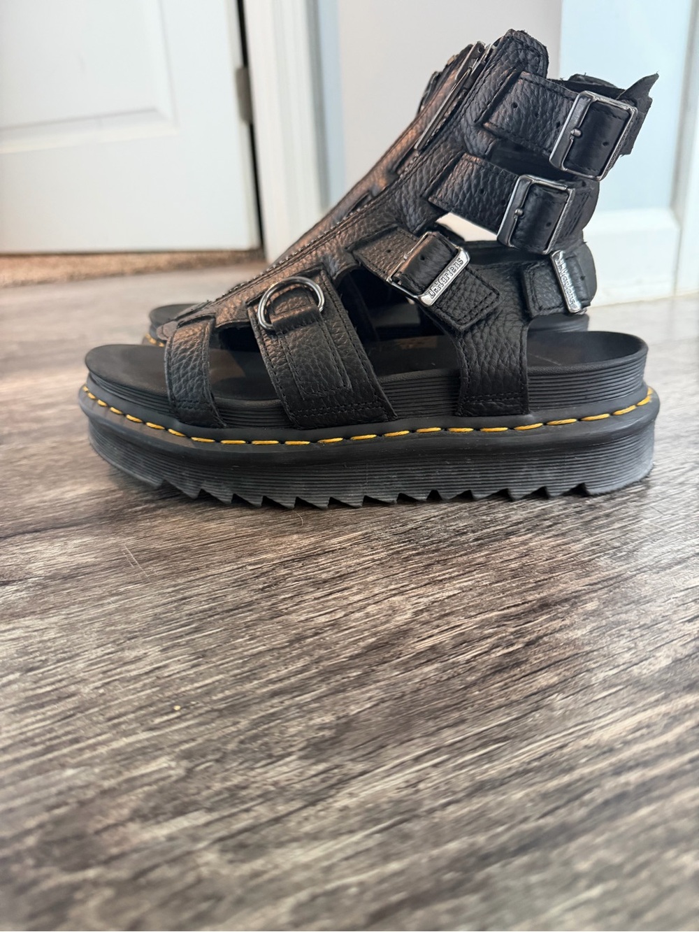 Dr. Martens Black Leather Platform Gladiator Sandal with Yellow Stitching
